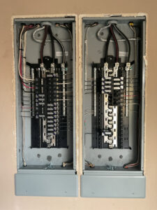 Two newly installed electrical panels with intricate wiring completed by Mr. Electric of Montgomery County Alabama in Montgomery, AL.