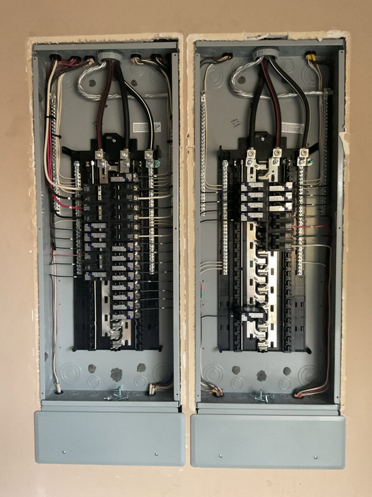 Two newly installed electrical panels with intricate wiring completed by Mr. Electric of Montgomery County Alabama in Montgomery, AL.