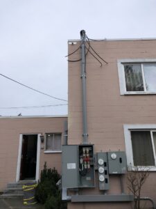 New electrical service entrance and meter bases installed on a building by Vets Electric Company in Tacoma, WA