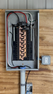 A new electrical sub-panel installation showing internal wiring by J Pownall Electric LLC in Hamilton, NJ.