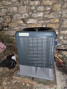 A newly installed Evcon outdoor air conditioning unit by Working Wolves Heating & Cooling LLC in Lawrence, KS.