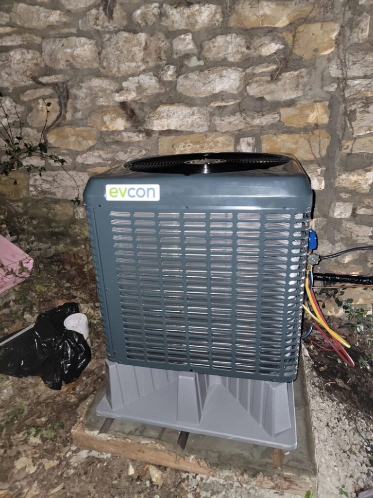 A newly installed Evcon outdoor air conditioning unit by Working Wolves Heating & Cooling LLC in Lawrence, KS.