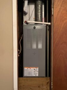 A new furnace or air handler unit installed in a utility closet by Circle L Heating and Cooling LLC in Atmore, AL.