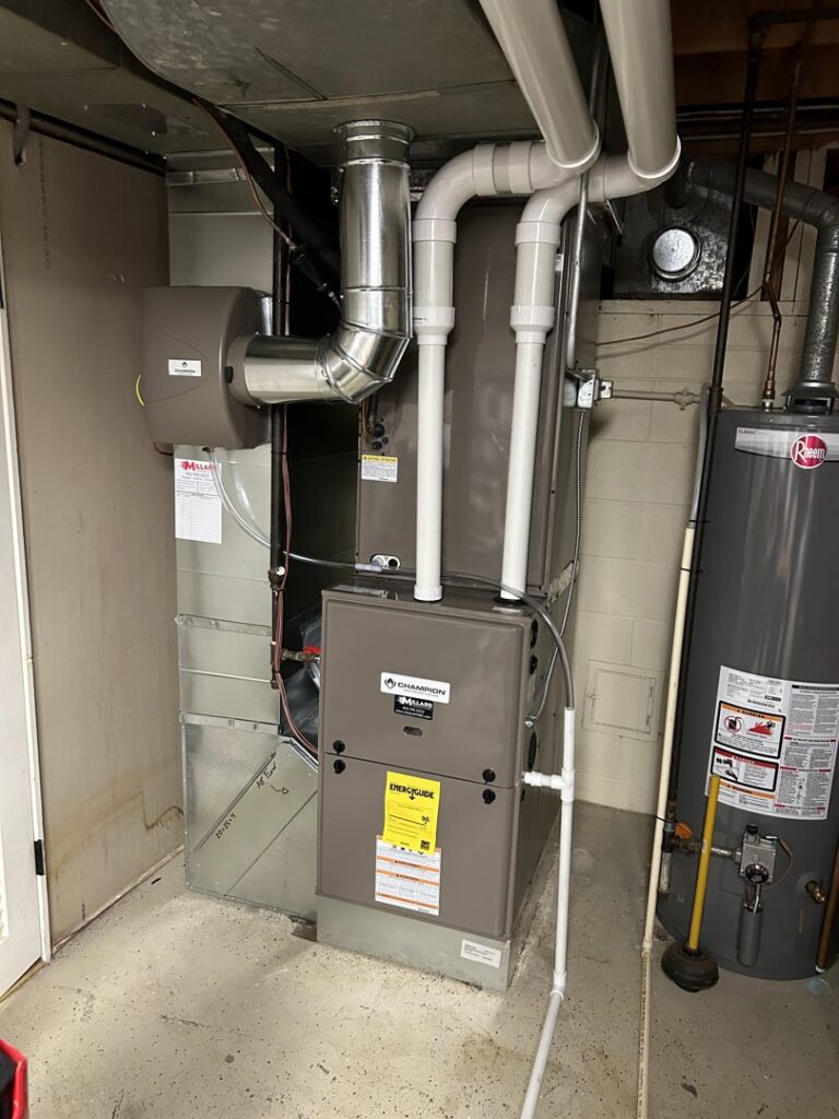 A newly installed furnace and air handler unit with ductwork by Millard Heating & Cooling in Elkhorn, NE.