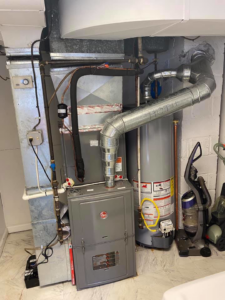 A new Rheem furnace and air handler unit installed with ductwork by Virtues Mechanical LLC in Baltimore, MD.