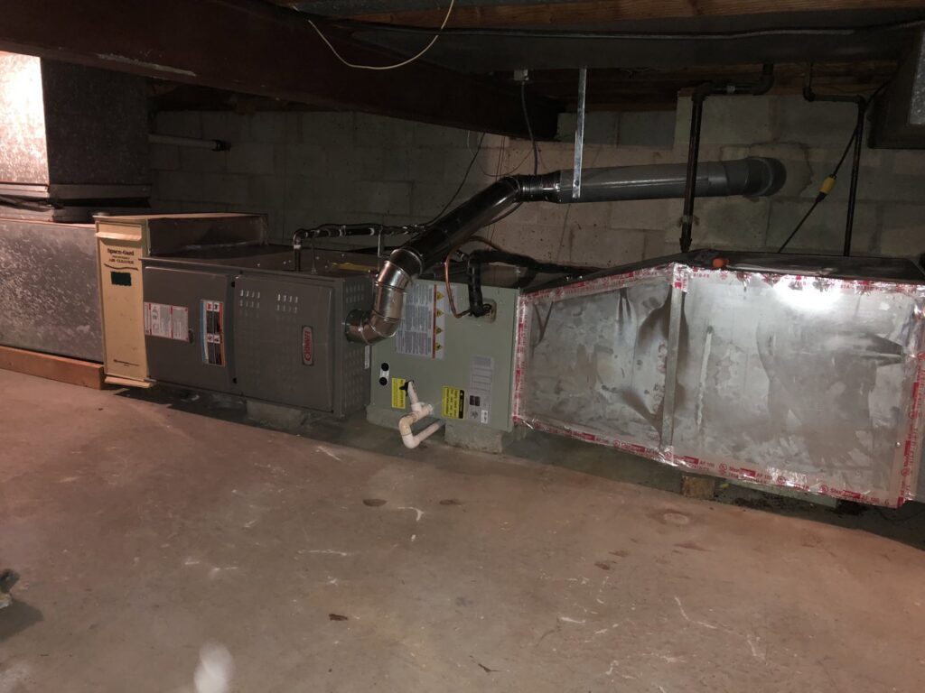 A new furnace and extensive ductwork installation in a basement, performed by Around The Town Heating and Cooling in Chicago, IL.
