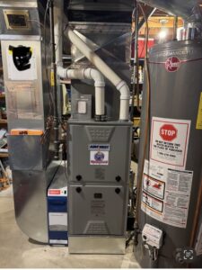 A new furnace and water heater system installed in a home by HVAC KING LLC in Maple Grove, MN