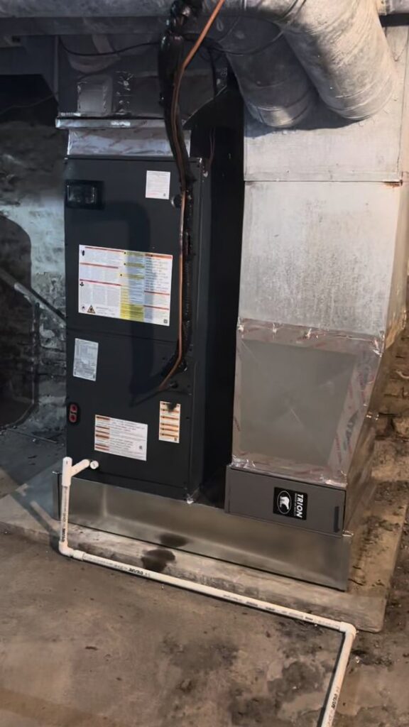 A new furnace and associated ductwork installed in a basement by Buckeye Mechanical Construction in Columbus, OH.