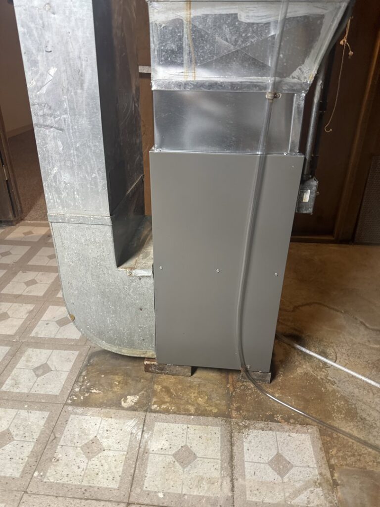 A new furnace unit connected to existing ductwork during installation by Done Right Air in West Allis, WI