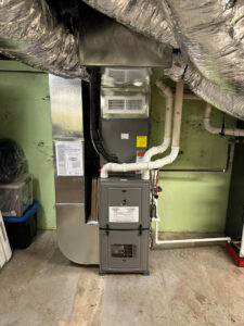 A newly installed furnace and ductwork system in a utility room by Dodrill Comfort & Energy Solutions in Cross Lanes, WV