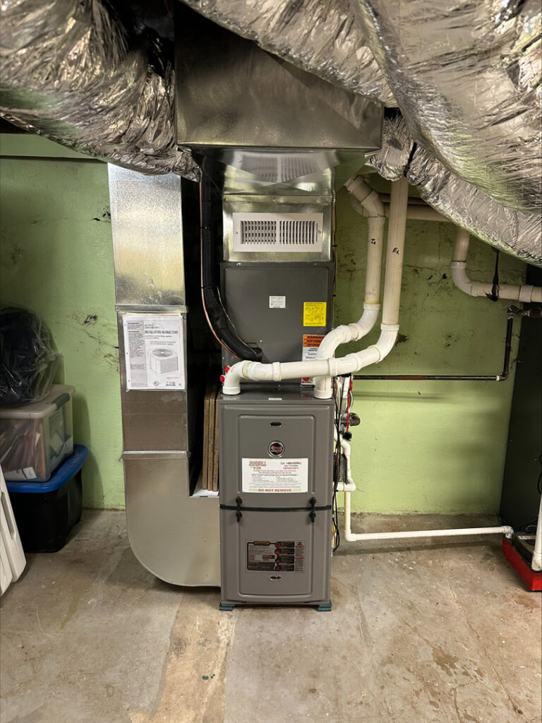 A newly installed furnace and ductwork system in a utility room by Dodrill Comfort & Energy Solutions in Cross Lanes, WV
