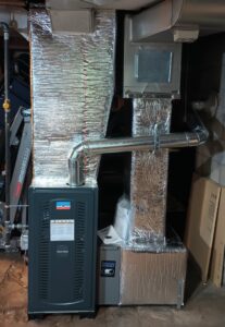 A new furnace and ductwork installation in a basement by MAC Heating and Cooling LLC in Waterbury, CT.