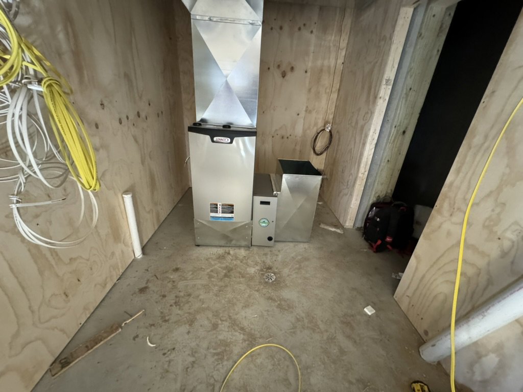 A new furnace and ductwork installed in a utility room during construction by Dischler Heating-Cooling & Fireplaces in Prairie du Sac, WI.