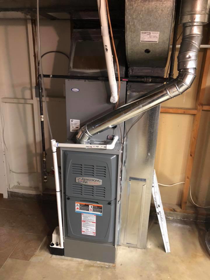 A newly installed Armstrong Air furnace and ductwork by 5280 Cooling Heating & Refrigeration in Lakewood, CO