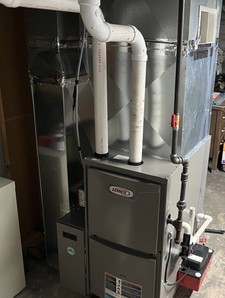 A new furnace and ductwork installation in a residential basement by Country Suburban Heating & Air Conditioning & Sons, Inc. in Utica, NY.