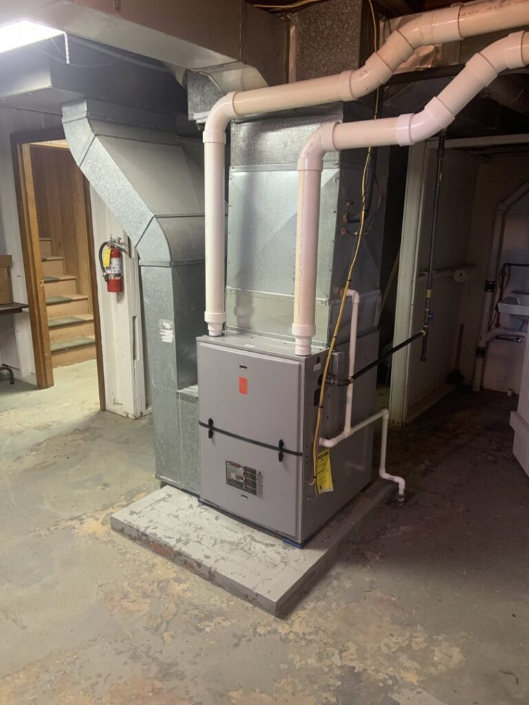A new furnace and ductwork installation in a utility room by Pacifico Heating and Cooling in Shadyside, OH.