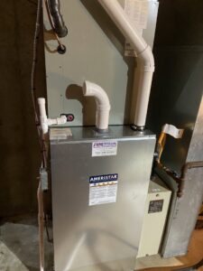 A newly installed or serviced indoor furnace and air handler unit by F & S Williams in Lafayette, IN.