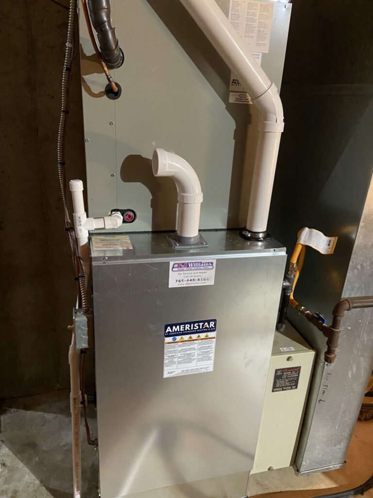 A newly installed or serviced indoor furnace and air handler unit by F & S Williams in Lafayette, IN.