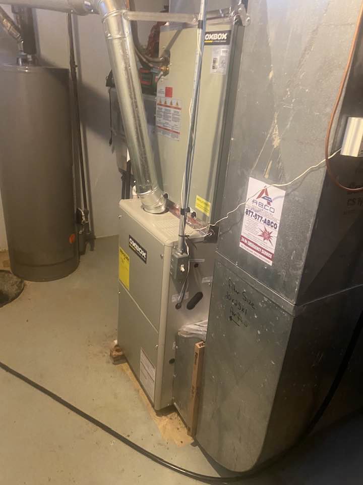 A newly installed OXBOX furnace and ductwork by Good Helpers Heating, Cooling & Labor Services LLC in Detroit, MI.
