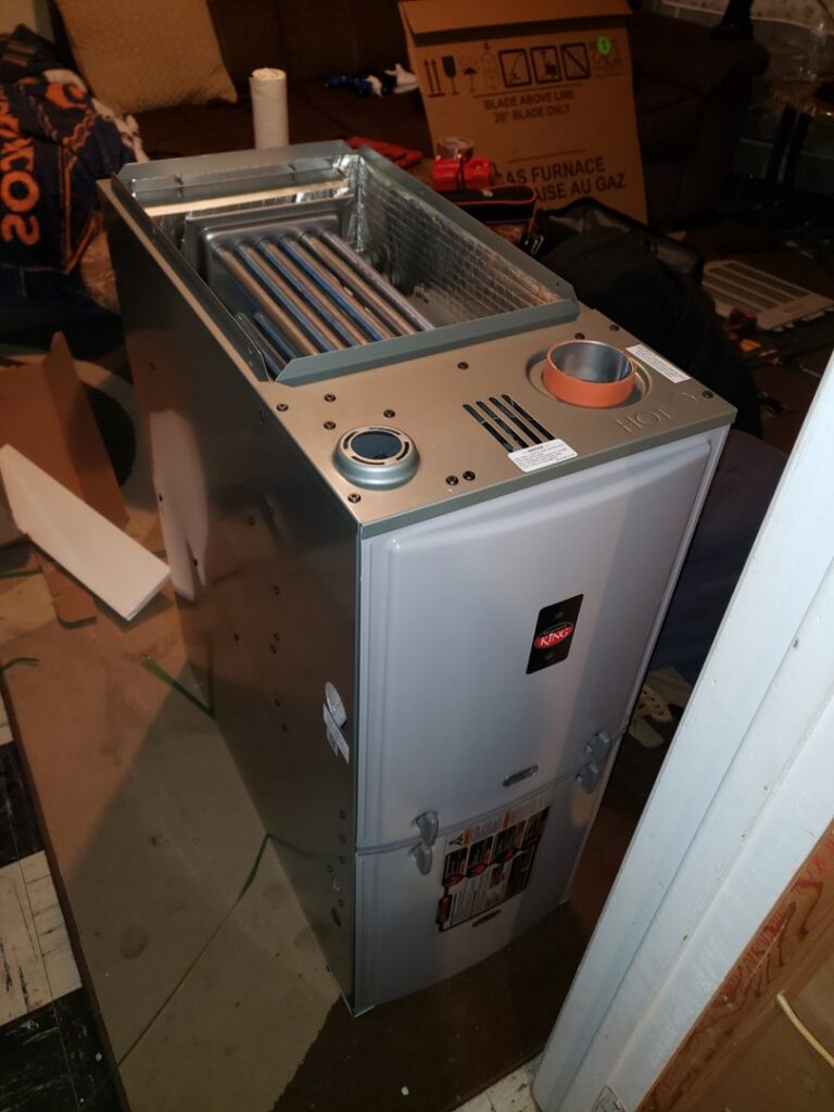 A new furnace unit, partially unboxed and ready for installation by Thin Air Heating and Cooling in Arvada, CO.