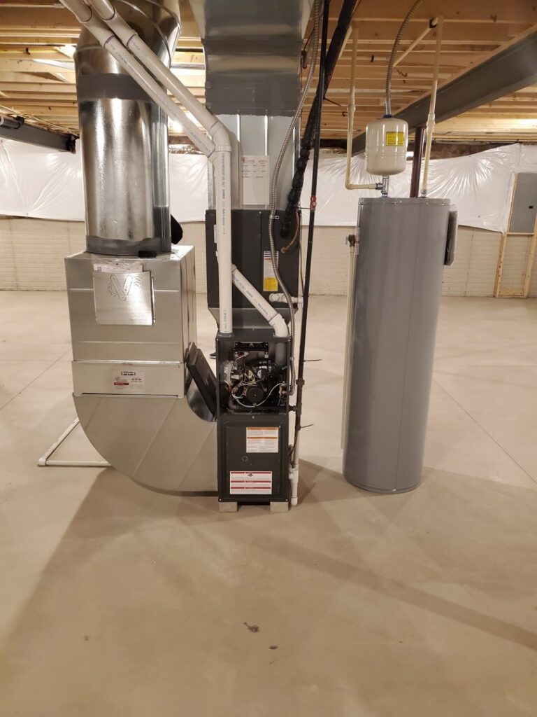A new furnace, water heater, and ductwork installation in a basement by Airtechservicesohio.com in Columbus, OH