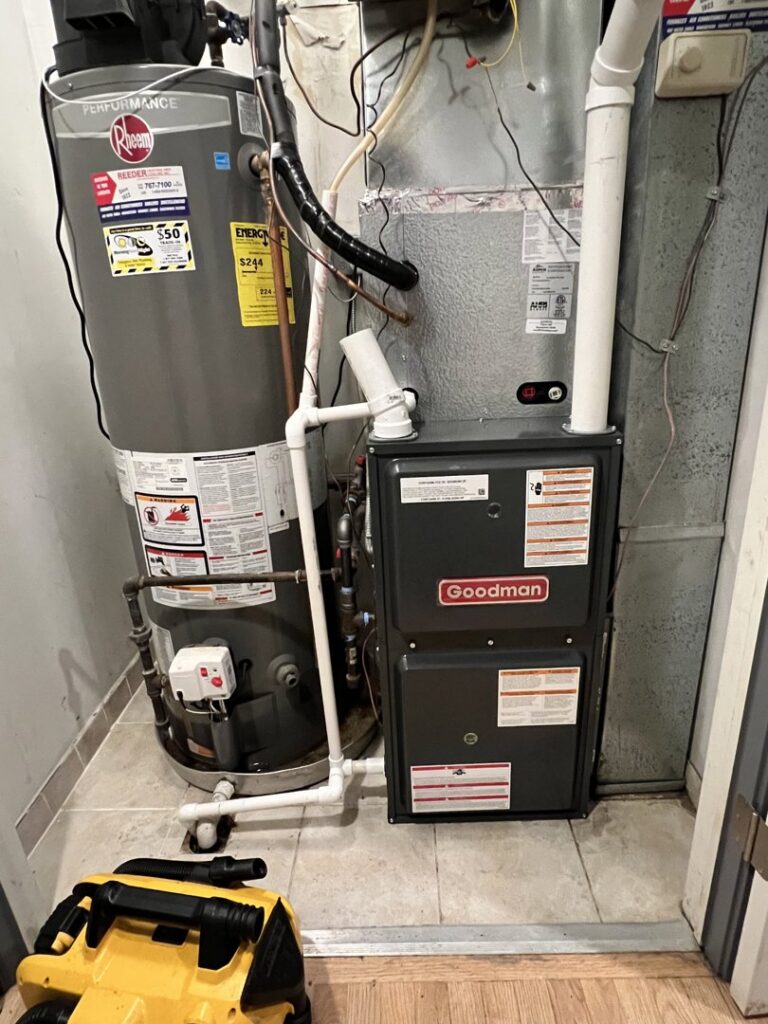 A newly installed Goodman furnace and Rheem water heater by Modern HVAC Technology in Chicago, IL.
