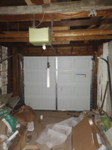 Interior view of a new garage door and opener installation by Codiwayne Construction & Door in South Bend, IN.