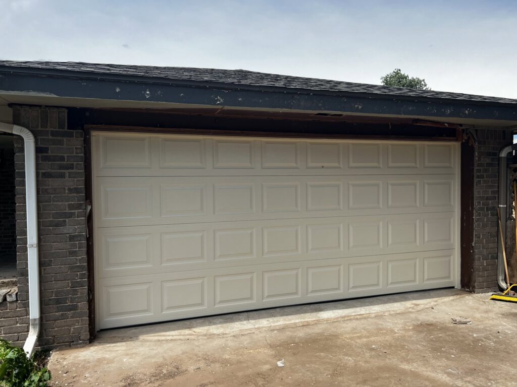 A newly installed garage door replacement completed by Rhino Garage Doors LLC OKC in Edmond, OK.