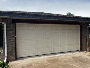 A newly installed garage door replacement completed by Rhino Garage Doors LLC OKC in Edmond, OK.