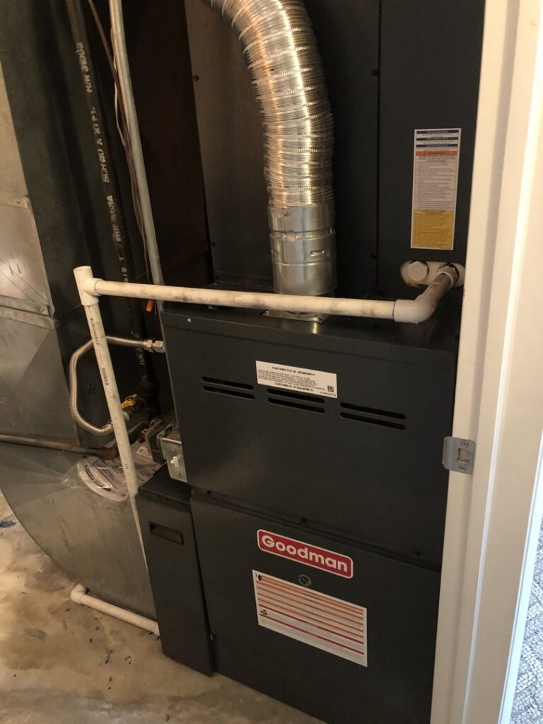 A new Goodman furnace and associated ductwork installed in a utility closet by EPIC Heating and Air in Loveland, CO