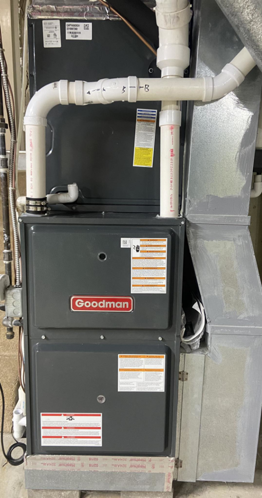 A newly installed Goodman furnace and air handler system with ductwork by MK Home Services in Florence, KY.