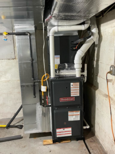 A new Goodman furnace and air handler unit installation with ductwork by Patrick Heating and Cooling LLC in Newark, NJ.
