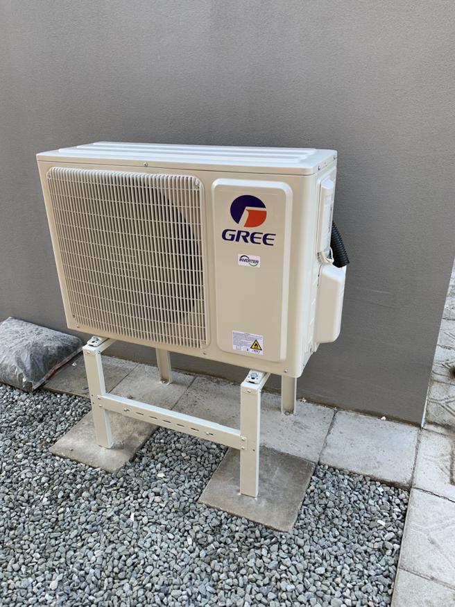 A newly installed GREE mini-split outdoor unit by Kai's Heat & Cool in Naperville, IL