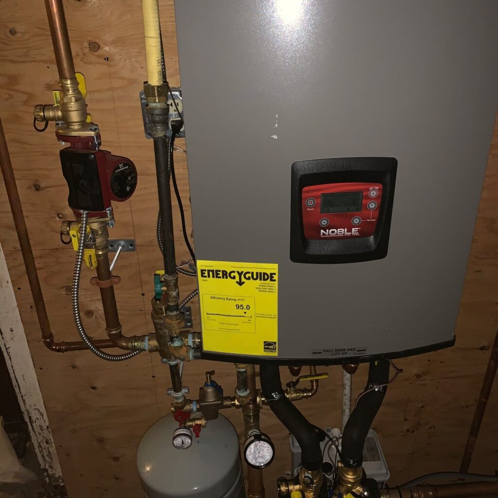 A new high-efficiency boiler installation with an EnergyGuide label by Hyper Fusion Heating & Cooling in Waterbury, CT.