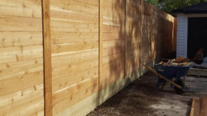 A newly installed horizontal wood fence, showcasing modern design by G L Fence & Remodeling in Arlington, TX.