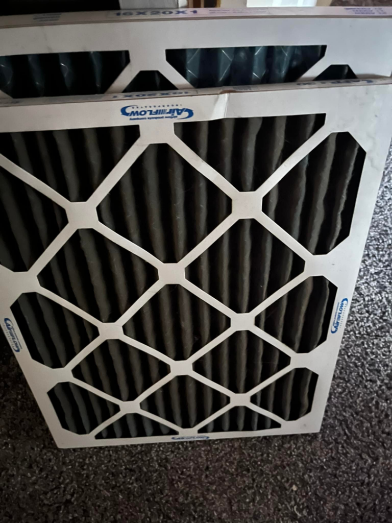 A new, clean HVAC air filter ready for installation by Hawthorne Heat & Air in Pollock, LA.