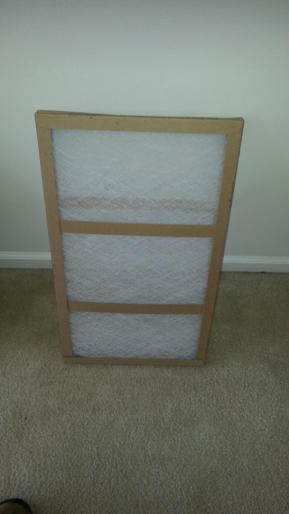 A clean, new HVAC air filter ready for replacement by Air Vent Master in Charlotte, NC.