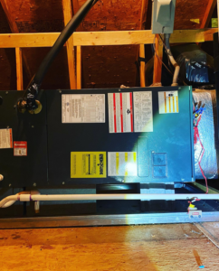 A newly installed HVAC air handler unit in an attic by B & H Heating and Air Services LLC in Local City, ST.