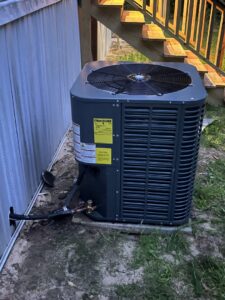A newly installed outdoor HVAC condenser unit by Affordable heating and air conditioning in Meridian, MS.