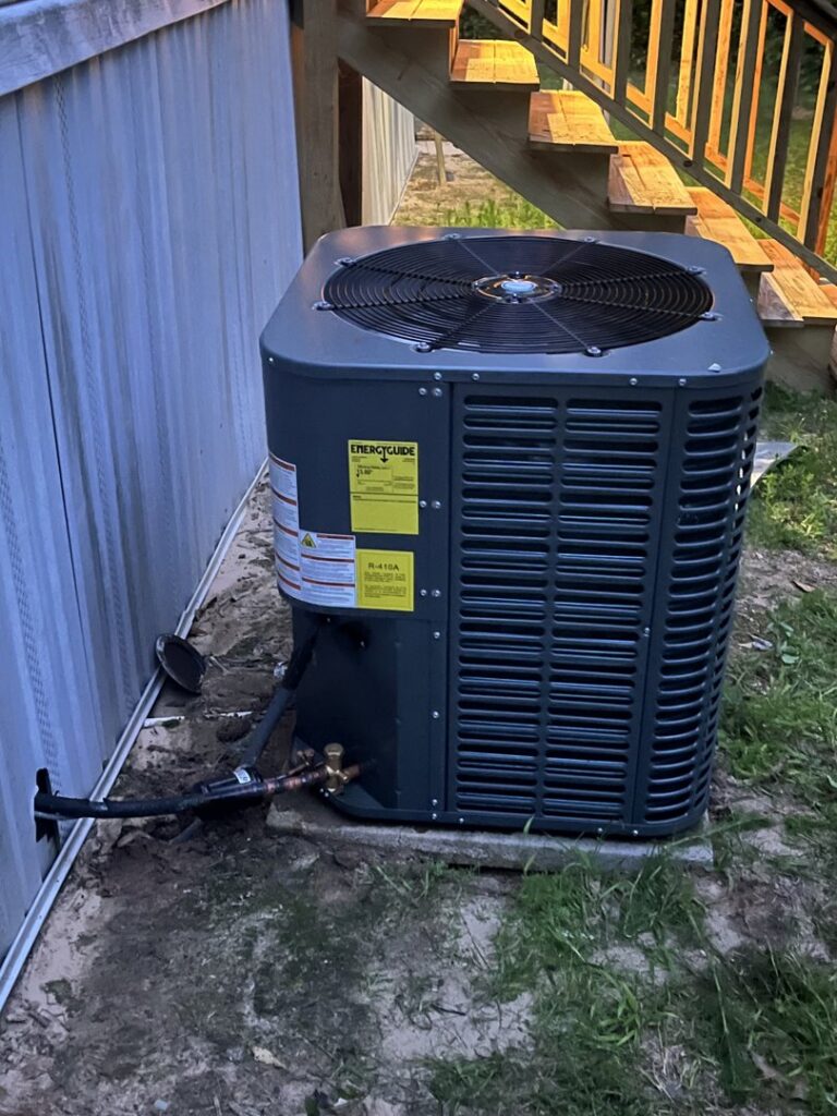 A newly installed outdoor HVAC condenser unit by Affordable heating and air conditioning in Meridian, MS.
