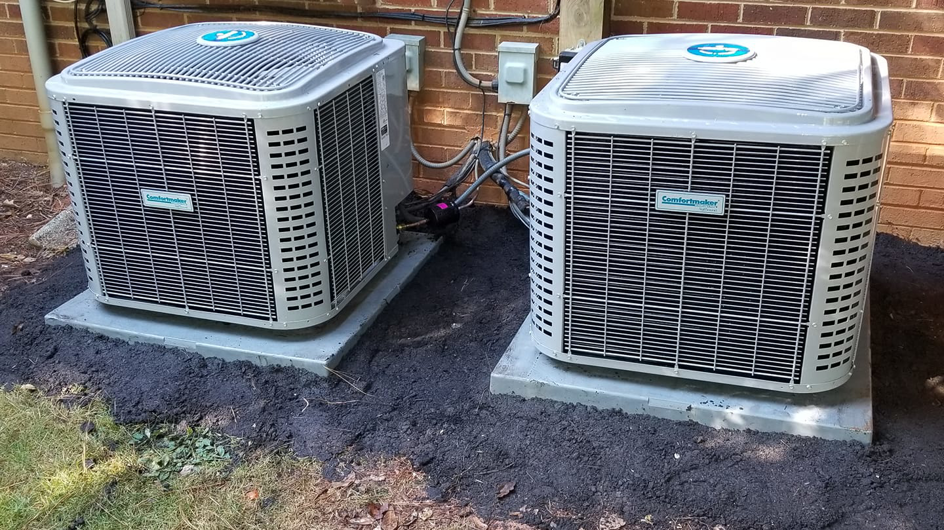 Two newly installed outdoor HVAC condenser units by HD Mechanical Services in Buena Park, CA