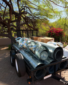 A trailer loaded with new galvanized HVAC ductwork for installation by Otto's Air Conditioning & Heating in Mesa, AZ.