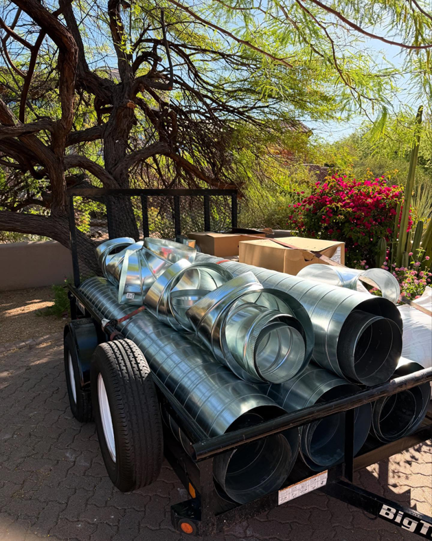 A trailer loaded with new galvanized HVAC ductwork for installation by Otto's Air Conditioning & Heating in Mesa, AZ.