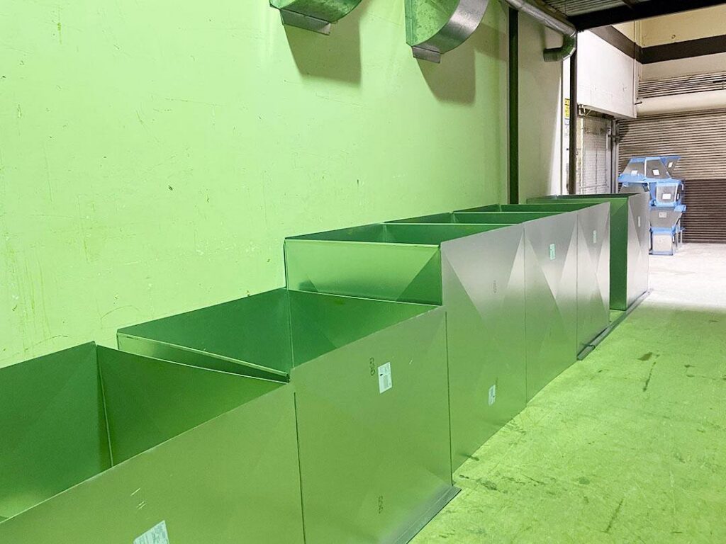 Stacks of new sheet metal ductwork sections ready for installation by HVAC Solutions in Colorado Springs, CO