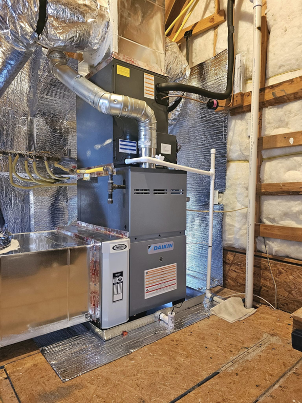 A new Daikin HVAC furnace and air handler installation by A1 Mechanical Heating and Cooling Services in Waynesville, OH.