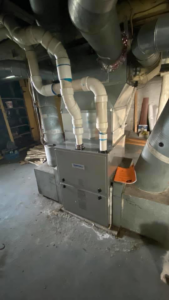 A newly installed HVAC furnace and ductwork system by Allegheny General Contracting Services Heating and Cooling in Pittsburgh, PA.