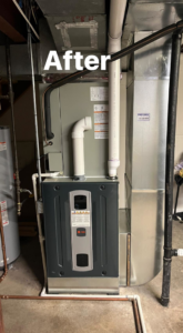 A newly installed HVAC furnace and air handler unit in a basement by Pro-Cool Air Conditioning & Heating in Blue Springs, MO.