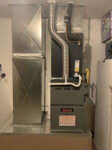A newly installed indoor HVAC furnace and air handler unit with ductwork by Sahara Air Conditioning & Heating in Las Vegas, NV