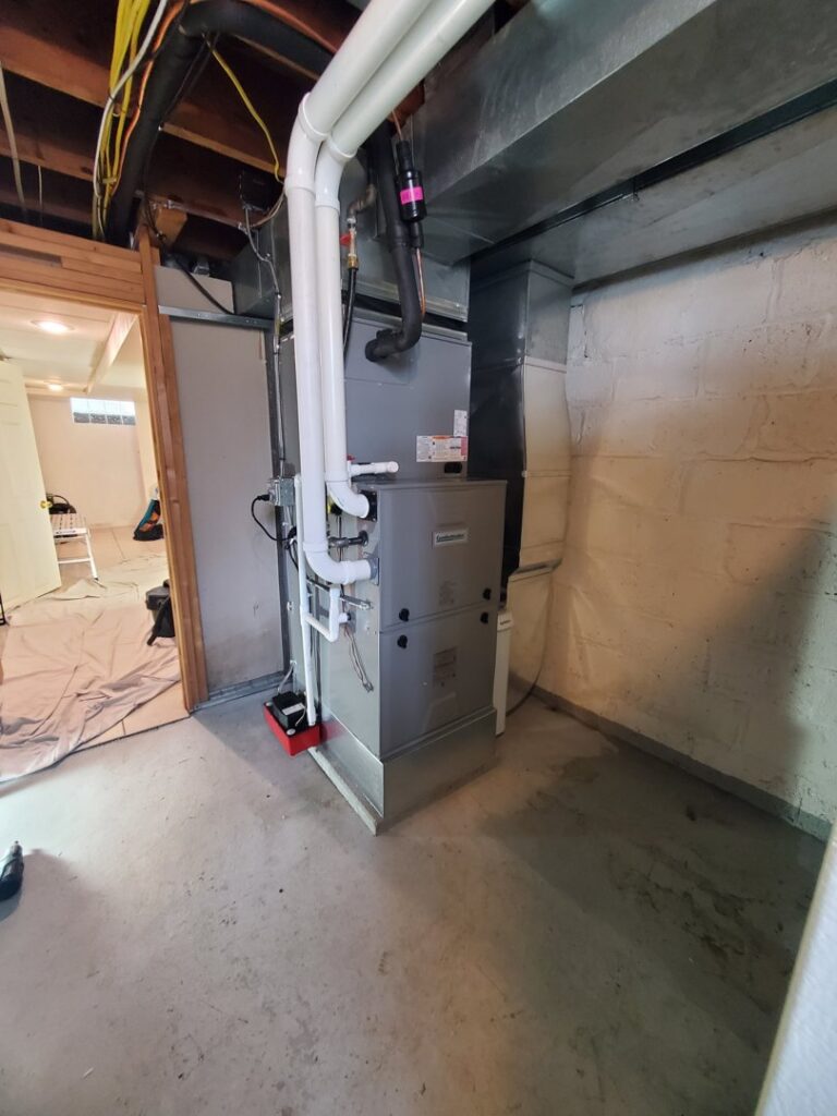 A new HVAC furnace and air handler system with ductwork installed by Bouvy Heating & Air Conditioning Services in Pittsburgh, PA.