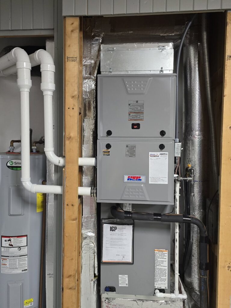 A modern indoor HVAC furnace and air handler system installed by Warren Mechanical, LLC in Carmel, IN.